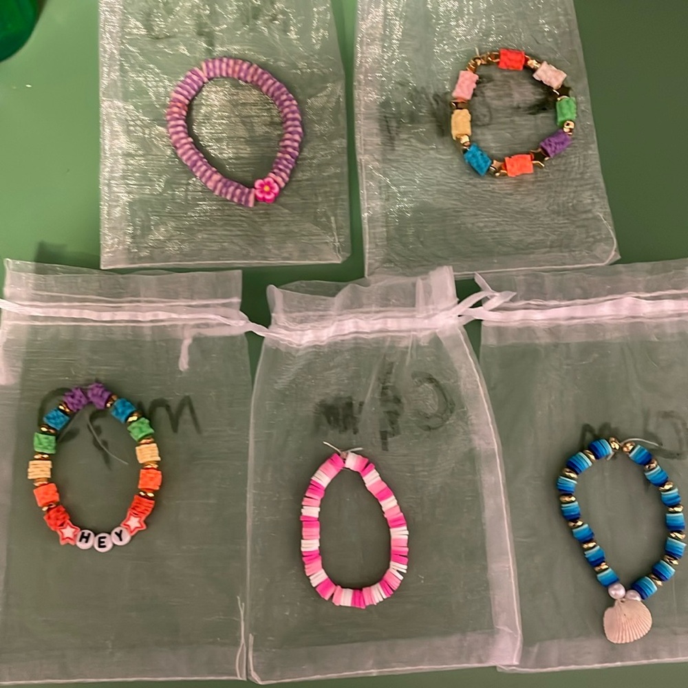 Clay head bracelets, five